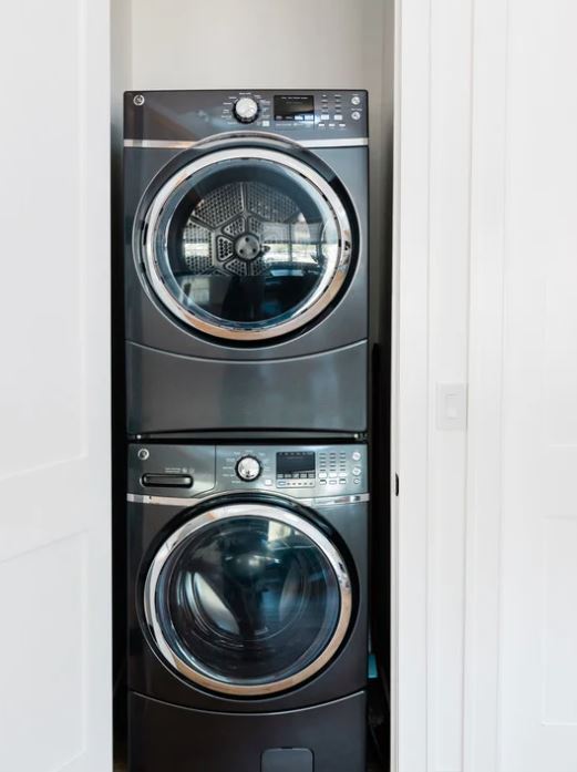 Compact laundry space with washer and dryer – washer repair Los Angeles CA